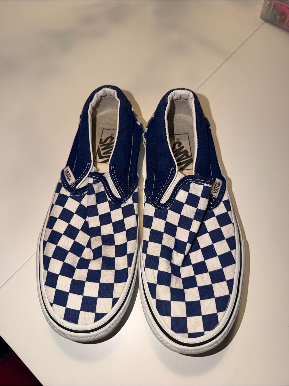 Vans Women’s Navy and White Checkerboard Slip-On Sneakers